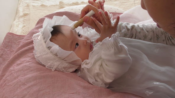 Applying makeup before a photoshoot.