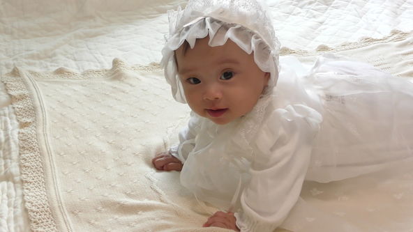 Cute Baby Model Wearing White Baby Dress, Rocking On All Fours