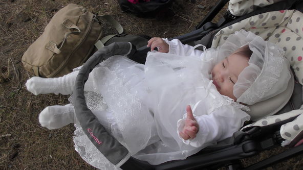 Cute Baby Model Wearing White Baby Dress, Go Out Riding on the Pink Stroller